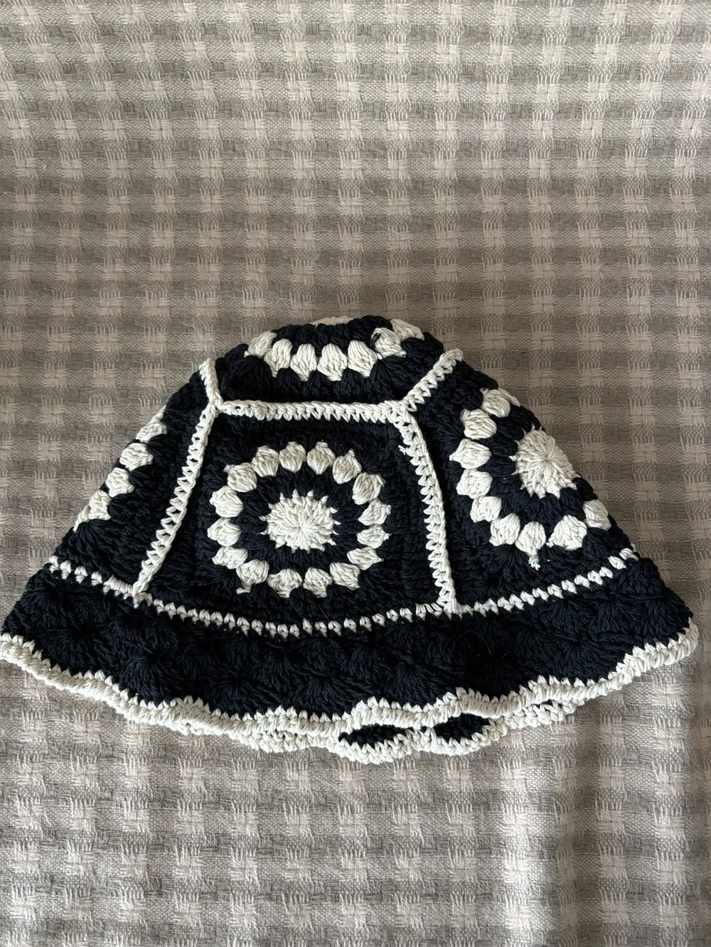 HAUTE HIPPIE BLACK AND WHITE CROCHET GRANNY SQUARE BUCKET HAT